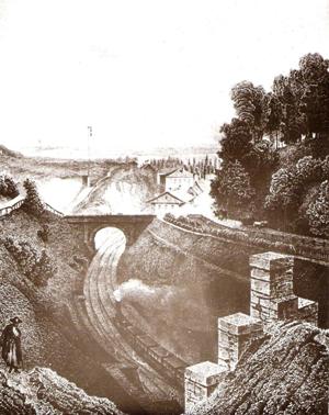  Bratislava - pohľad z vrchu bratisl. portálu tunela. Koľajisko a budovy 1. parostrojnej stanice, koš. návestidlo, viadukt cez zhlavie, vlak (faksimile). Anon, pred r. 1850, 128 x 182 
